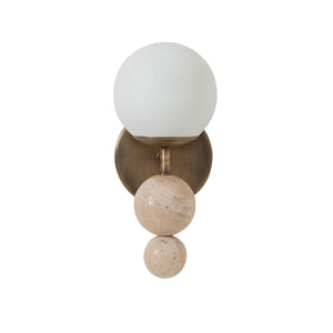 Celestia wall sconce with frosted glass globe and beige stone accents on a brass base