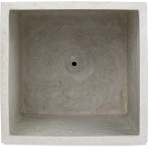 Top view of Alona Planter showing the interior in light concrete with a drainage hole.