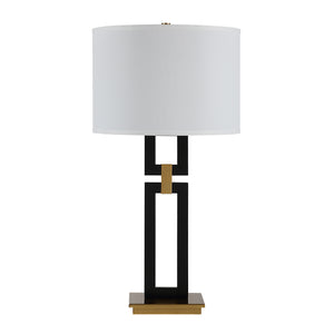 Lila Table Lamp with a white drum shade, black geometric base, and gold accents.