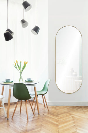 Marius Full Length Mirror displayed in a bright dining area with green chairs