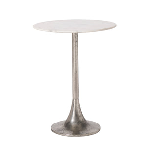 Eloa table with a round white marble top and a silver metal base