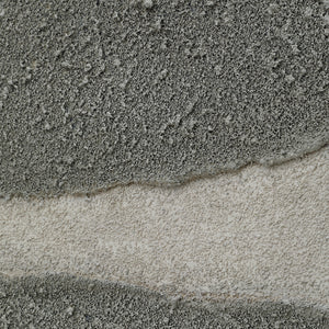 Close-up of Orso Canvas Art showing textured gray shapes and light background
