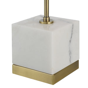 Volos Table Lamp with a white marble base and brass accents, showcasing a square design.