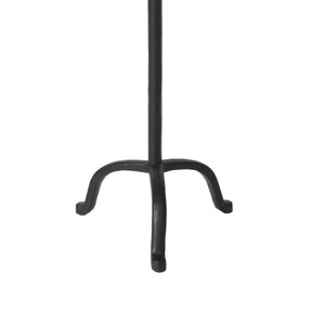 Base of the Agra candle holder showcasing the three-legged design in black metal.