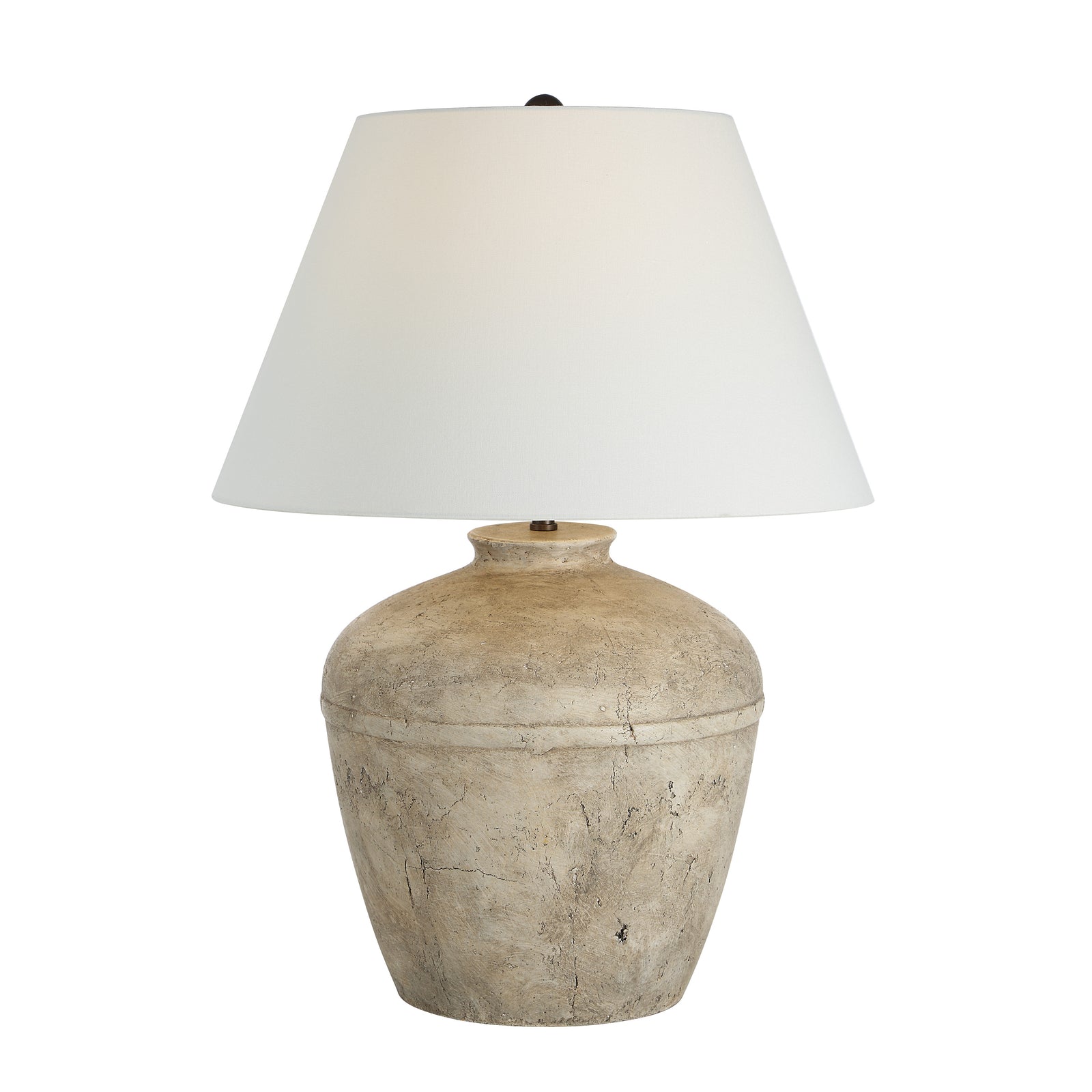 Heritage table lamp with a textured beige ceramic base and a white fabric shade.