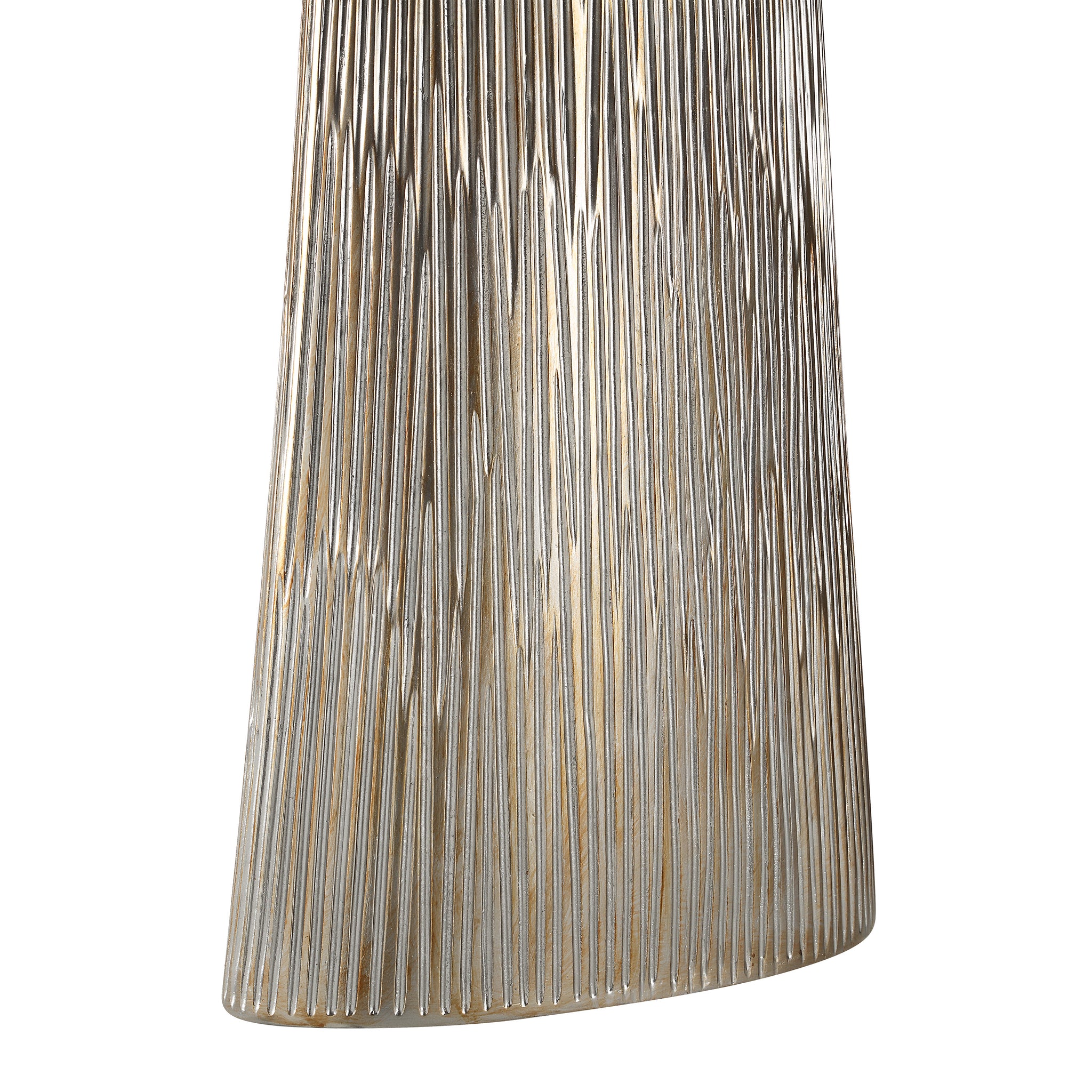 Close-up of Calma Table Lamp's silver textured base