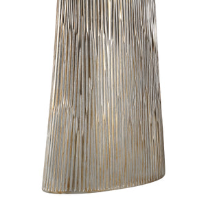 Close-up of Calma Table Lamp's silver textured base