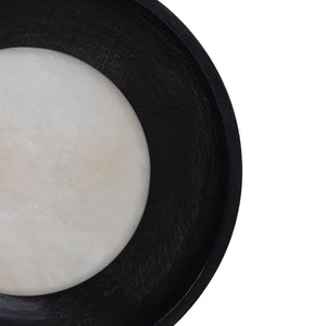 Haloa wall sconce showing a round white alabaster bulb set in a black wooden base