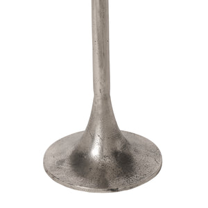 Close-up of Eloa table's silver metal base and stem