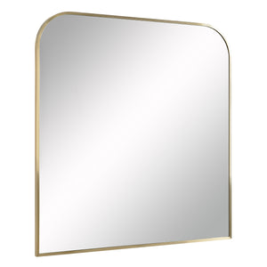 Joan Wall Mirror featuring a gold metal frame and a slightly angled view.