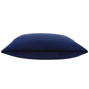 Side view of Pichu indoor pillow in navy blue with quilted texture.