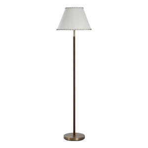 Elea floor lamp with a white shade and bronze base, featuring a textured brown stem.