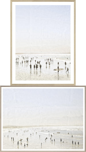 Idyllic Surf I & II Bundle featuring two framed wall art pieces depicting a beach scene with surfers and beachgoers, in soft pastel colors.