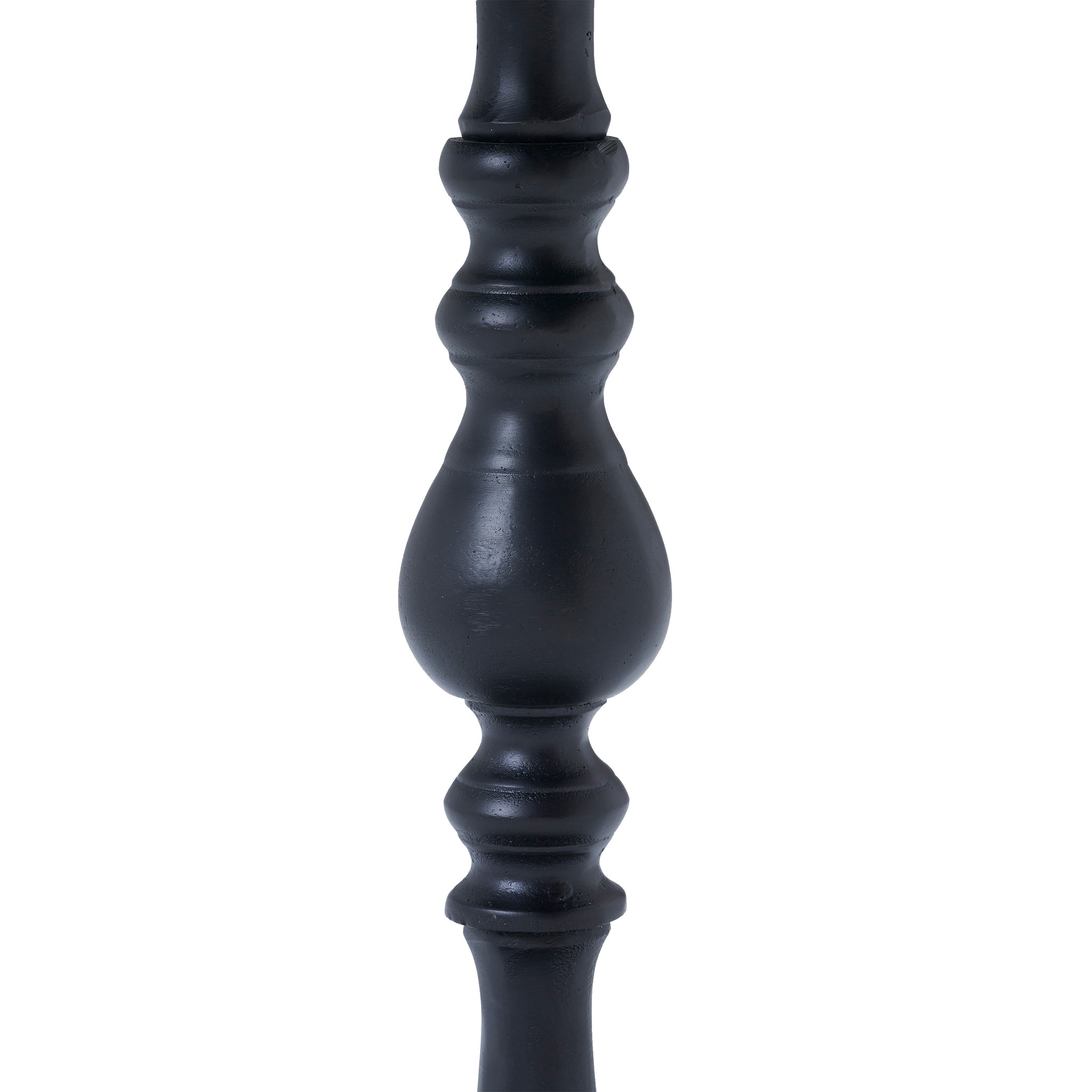 Detailed view of the black stem of Yates Side Table with decorative grooves