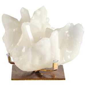 Broomfield Statue book holder featuring a white crystal design on a brass base.