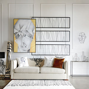 Studio Line - Linear Wall Art displayed in a modern living room setting with a sofa and decorative elements.