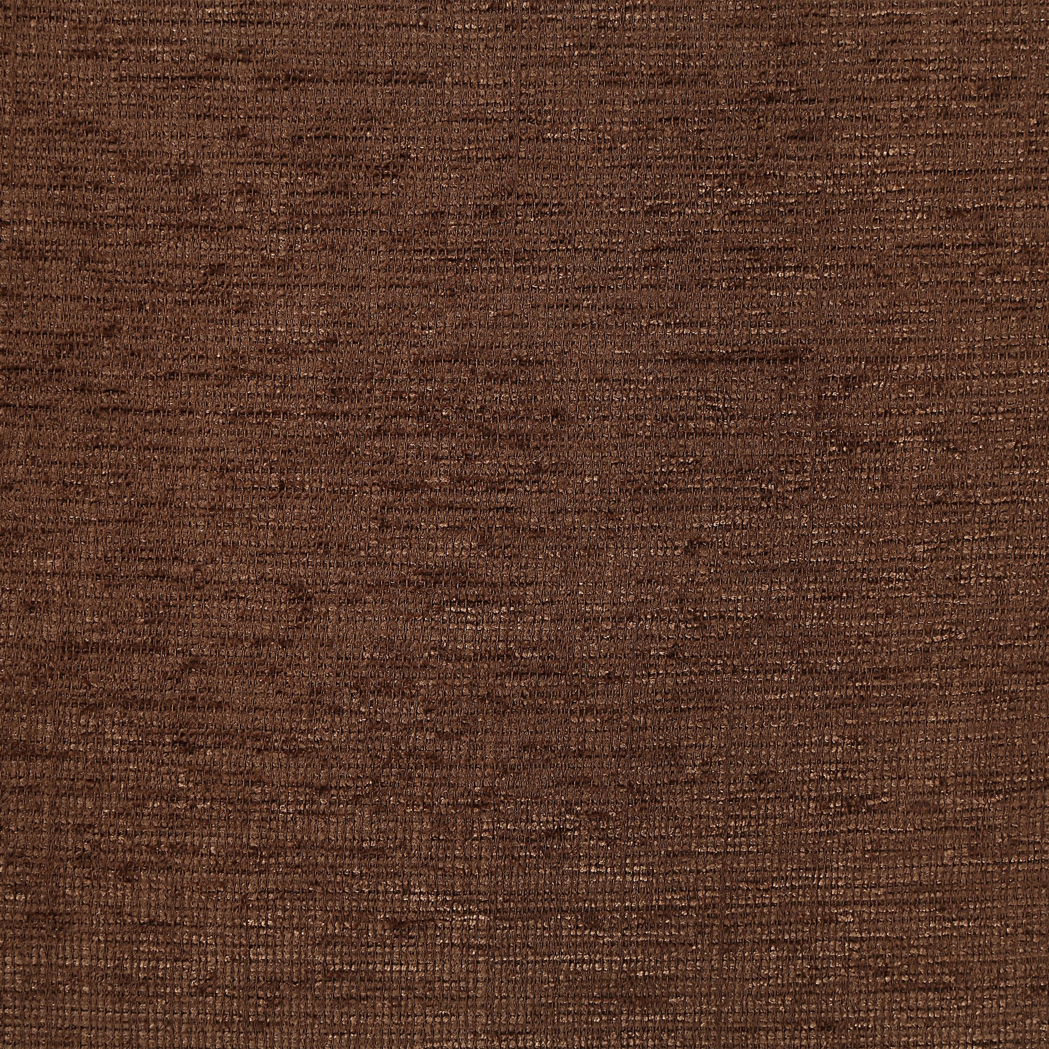 Close-up of Ferro pillow fabric in a warm brown tone with a textured appearance.