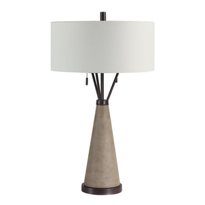 Lourdes Table Lamp with a textured gray base and a white fabric shade.