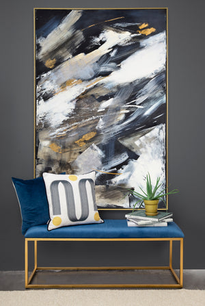 Westmount canvas art displayed above a blue bench with decorative pillows and a plant.