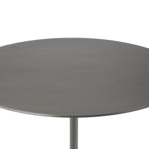 Top view of Aiden side table showcasing its smooth round metal surface.