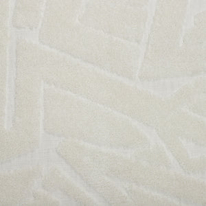 Close-up of Merano indoor pillow in white showcasing its textured design