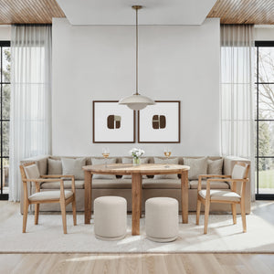 Abbie ceiling light fixture above a round wooden table in a modern dining area