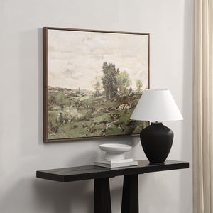 Nature canvas art by Renwil displayed on a wall above a table with a lamp and decor.