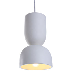 Kala Ceiling Fixture in white, showcasing a soft glow from the light with a textured finish.