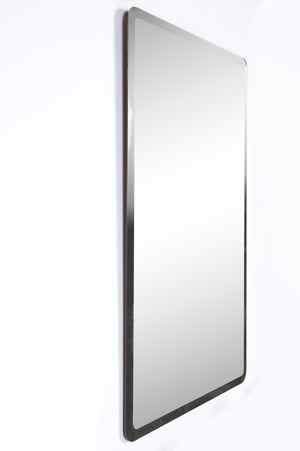 Danske Wall Mirror featuring a modern design with a silver frame, angled side view.