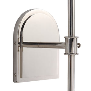 Close-up of Nowra wall sconce showcasing the shiny silver backplate and arm.