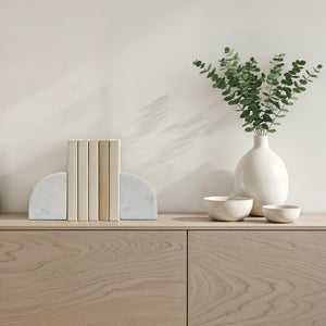 Carvella Bookends in Banswara Marble, styled with books and decorative items on a wooden shelf.