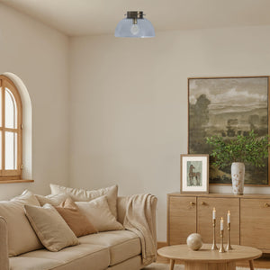 Liliane Flush Mount light in a cozy living room setting above a sofa.