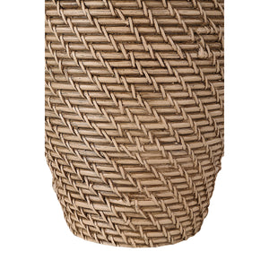 Close-up of Santal Table Lamp's woven brown base with intricate pattern