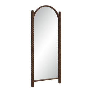 Ignatius mirror featuring a dark wood braided frame, angled view showcasing its arch.