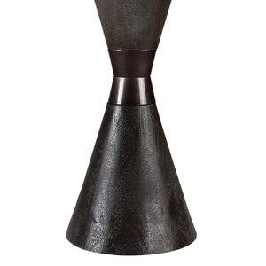 Close-up of Vyara table lamp's dark textured base and metal accent