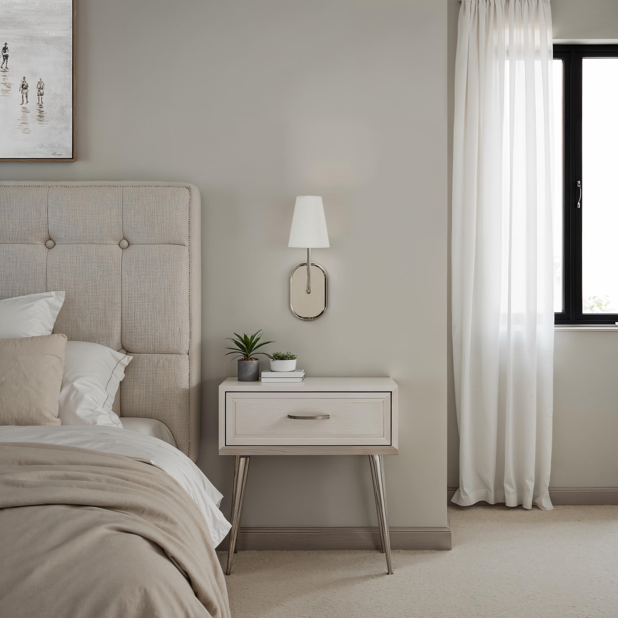 Annona wall sconce beside a stylish bed, enhancing the cozy bedroom ambiance.