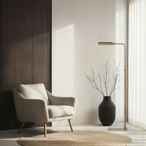 Kane floor lamp by Renwil in a stylish living room setting with a chair and vase