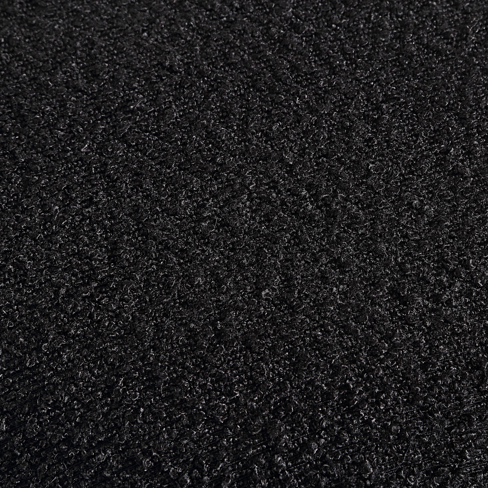 Close-up view of the black textured fabric of the Amrah stool by Renwil