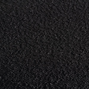 Close-up view of the black textured fabric of the Amrah stool by Renwil