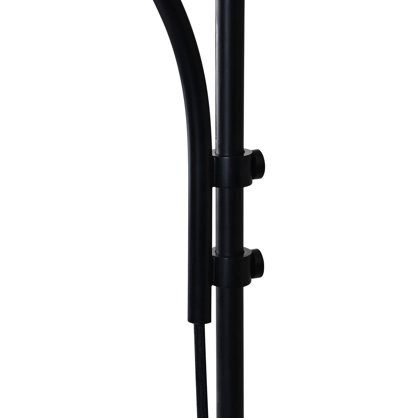 Draco Wall Sconce in black with a curved arm and dome shade, showcasing a vintage bulb.
