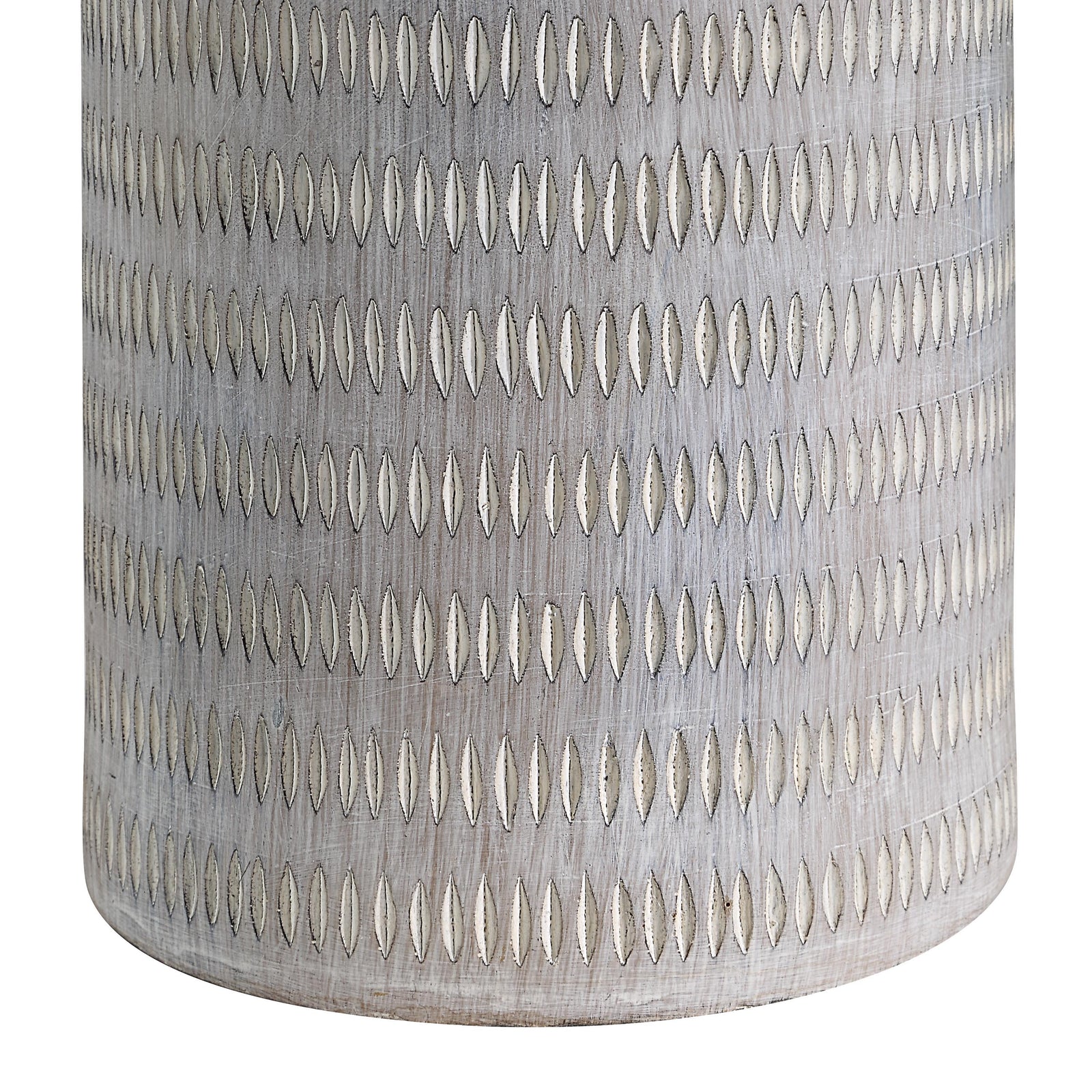 Baracoa table lamp with a textured gray ceramic base and white fabric shade.