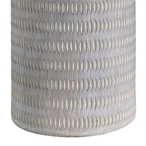 Close-up of Baracoa table lamp's gray ceramic base featuring an intricate pattern.