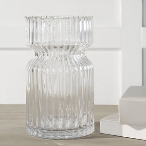Gladys Glass Vase by Renwil, clear ribbed glass vase on wooden table, styled with books.