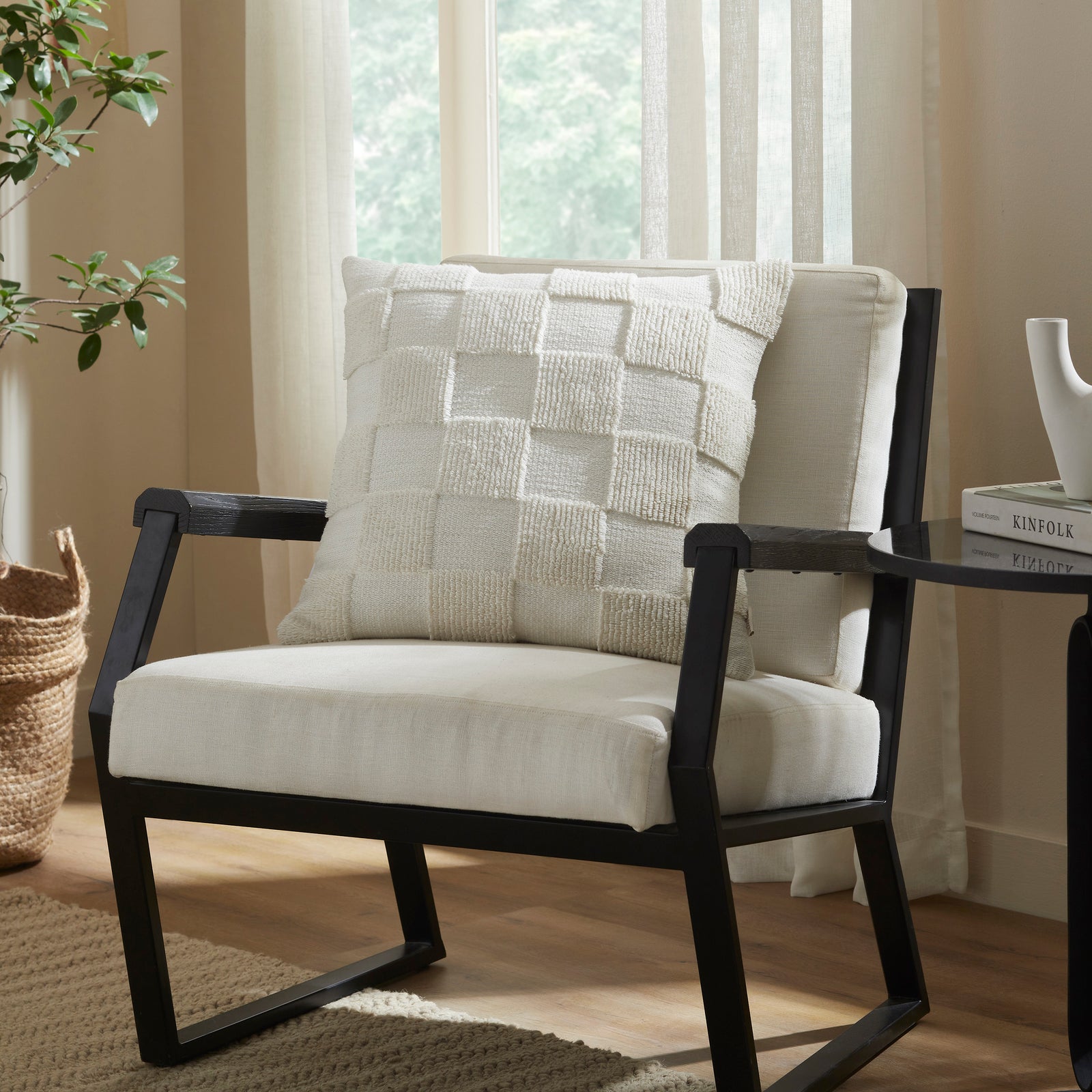 Terrah Indoor Pillow in white with textured checkerboard pattern