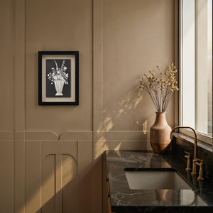 Tecoma canvas art displayed in a modern kitchen setting with a marble countertop and a vase.