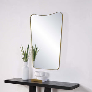 Artesia Wall Mirror displayed above a black console table with decorative items.