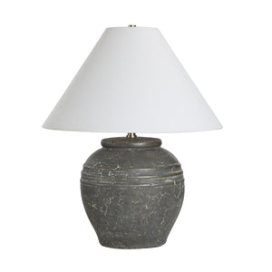 Lino Table Lamp with a gray ceramic base and white fabric shade, side view.