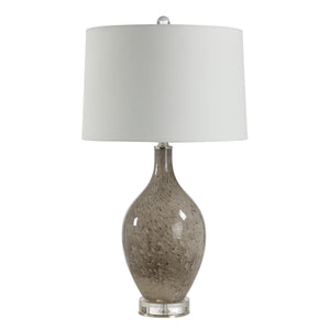 Vienne Table Lamp with a speckled gray glass base and white fabric shade.