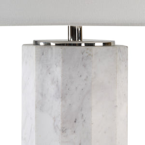 Close-up of Veda table lamp showcasing the textured white marble base and chrome detailing.