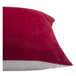 Cora Indoor Pillow featuring a burgundy velvet top and a linen bottom edge.